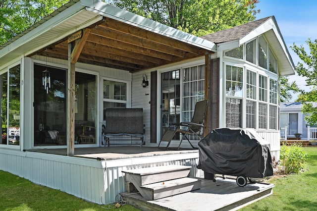 15 Allens Way Unit 18, Raymond, ME 04071 - back of house with a sunroom and a wooden deck