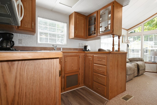 15 Allens Way Unit 18, Raymond, ME 04071 - kitchen with visible vents, white microwave, plenty of natural light, and lofted ceiling