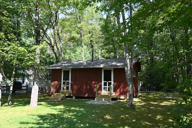 15 Allens Way Unit 18, Raymond, ME 04071 - view of outbuilding featuring entry steps, fence, and an outbuilding