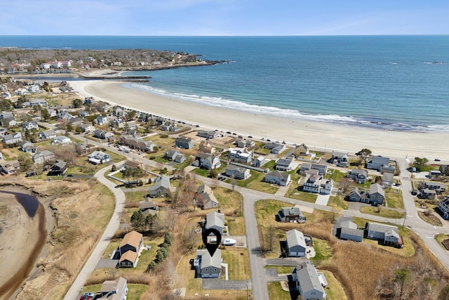 bird's eye view featuring a beach view, a residential view, and a water view