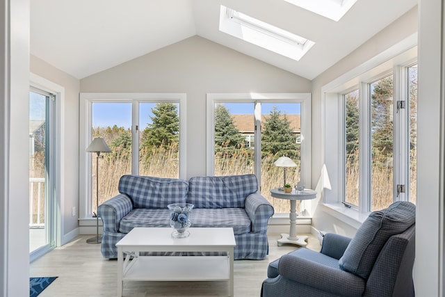 sunroom / solarium featuring a wealth of natural light and a skylight