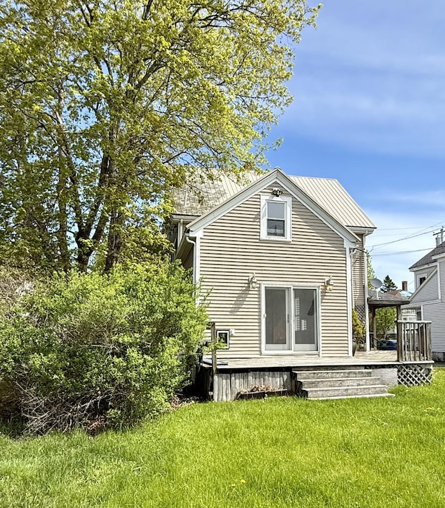 68 Washington St, Eastport, ME 04631 - rear view of house with a yard and a deck
