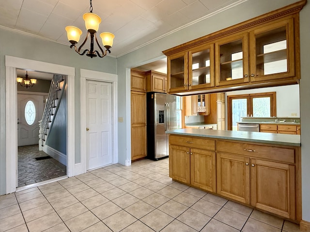 68 Washington St, Eastport, ME 04631 - kitchen featuring a chandelier, appliances with stainless steel finishes, ornamental molding, plenty of natural light, and hanging light fixtures