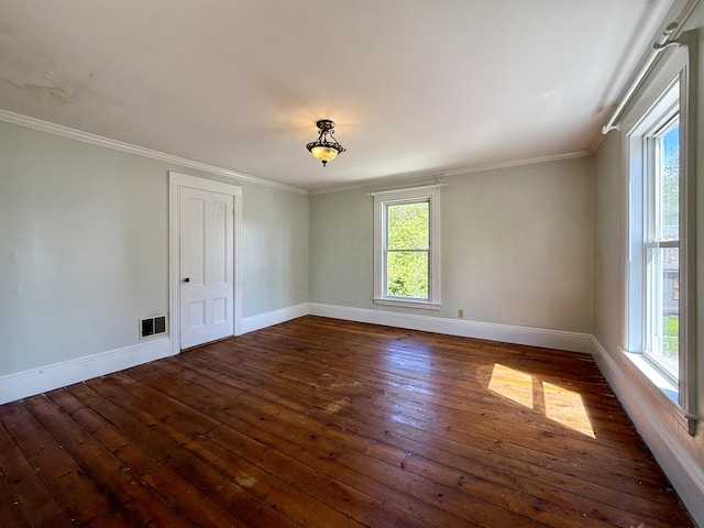 68 Washington St, Eastport, ME 04631 - spare room with dark wood finished floors, baseboards, and ornamental molding