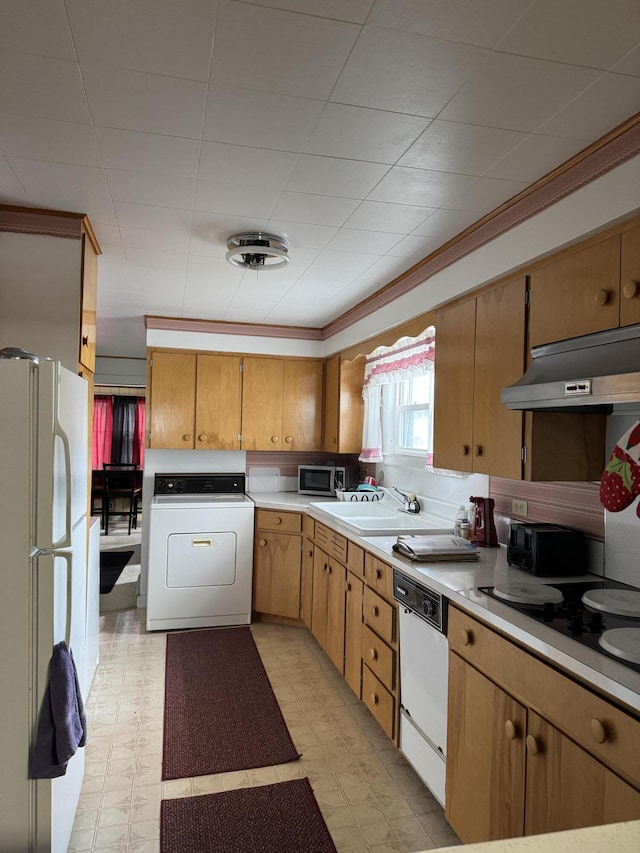 11 Pleasant St, Limestone, ME 04750 - kitchen with a sink, white appliances, washer / dryer, under cabinet range hood, and light countertops