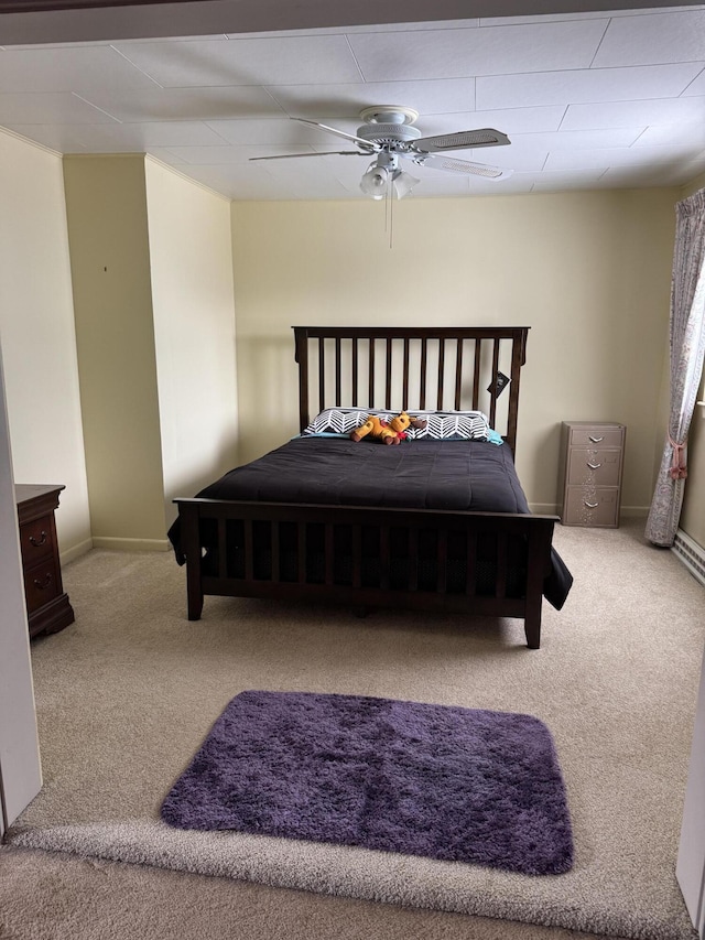11 Pleasant St, Limestone, ME 04750 - bedroom with baseboards, a ceiling fan, and carpet floors
