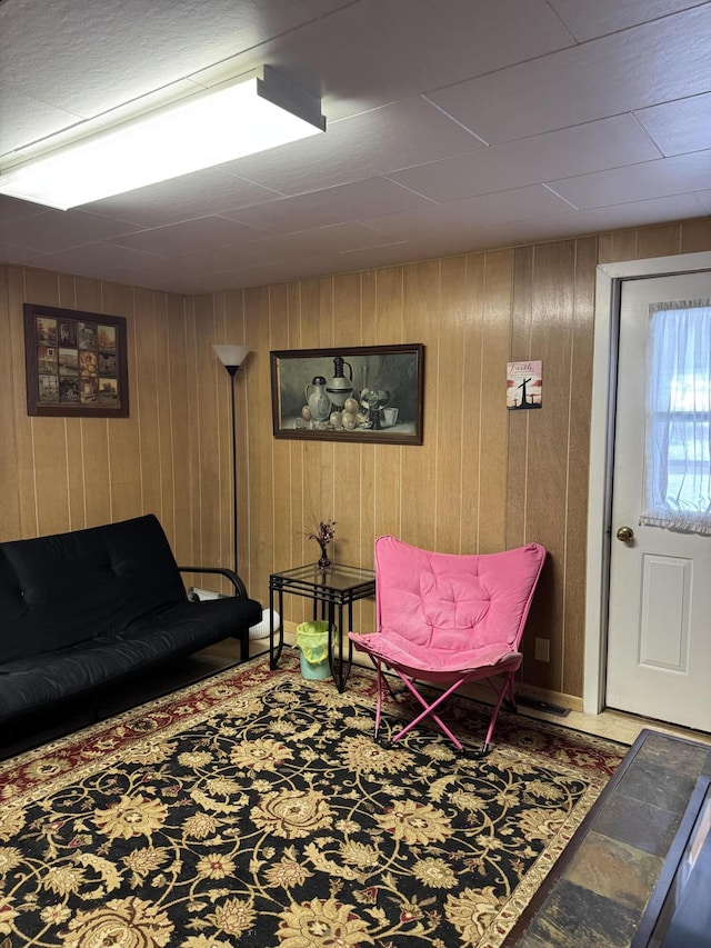 11 Pleasant St, Limestone, ME 04750 - living area featuring wooden walls