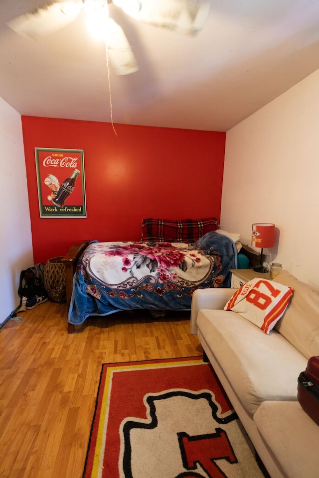 bedroom featuring wood finished floors