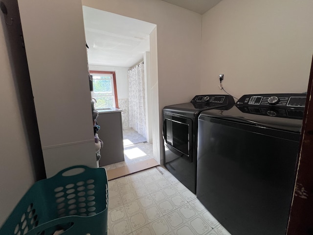 113 River Rd, Dresden, ME 04342 - laundry area with washing machine and dryer and light floors