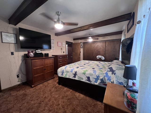 113 River Rd, Dresden, ME 04342 - bedroom featuring beamed ceiling, carpet floors, wallpapered walls, and ceiling fan