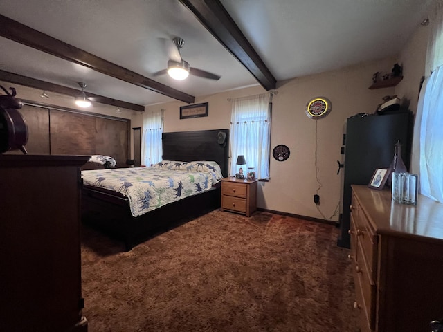 113 River Rd, Dresden, ME 04342 - carpeted bedroom featuring beamed ceiling and a ceiling fan