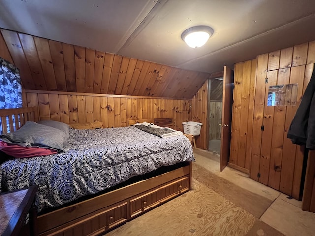113 River Rd, Dresden, ME 04342 - bedroom featuring wooden walls and lofted ceiling