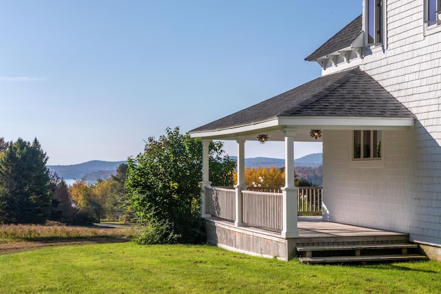 26 Old Searsport Ave, Belfast, ME 04915 - view of yard featuring a deck with mountain view