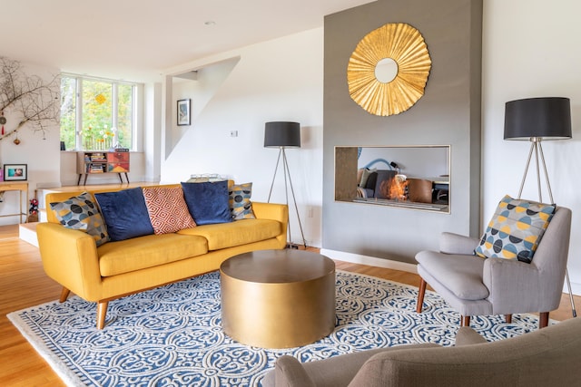 26 Old Searsport Ave, Belfast, ME 04915 - living room with baseboards and wood finished floors