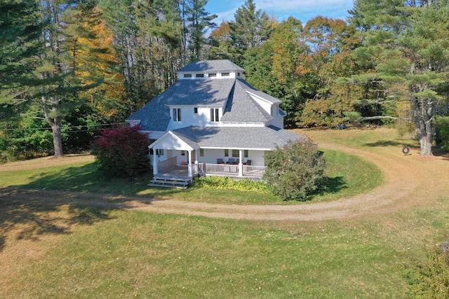 26 Old Searsport Ave, Belfast, ME 04915 - view of front of house featuring roof with shingles and a front lawn
