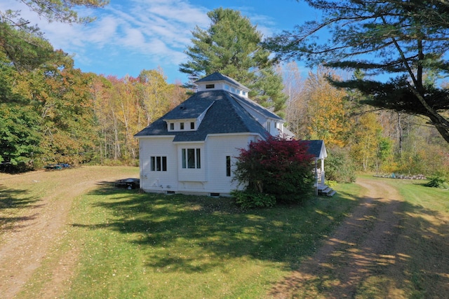 26 Old Searsport Ave, Belfast, ME 04915 - view of property exterior with a lawn and a wooded view