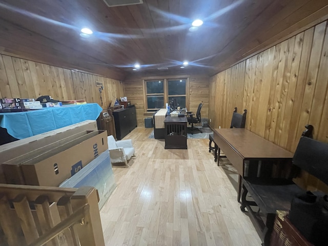 5 Canoe Ct Unit T3 R9, Nwp, ME 04462 - bedroom featuring wooden walls, light wood-style floors, and a desk