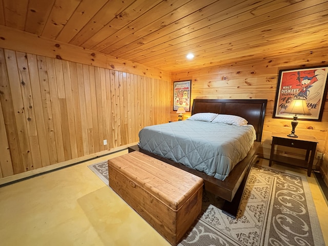5 Canoe Ct Unit T3 R9, Nwp, ME 04462 - bedroom with wooden walls, wood ceiling, and concrete flooring