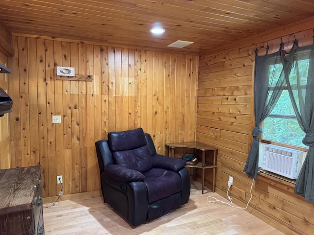 5 Canoe Ct Unit T3 R9, Nwp, ME 04462 - living area with wood finished floors, wooden walls, wooden ceiling, recessed lighting, and cooling unit