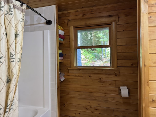 5 Canoe Ct Unit T3 R9, Nwp, ME 04462 - full bathroom featuring shower / tub combo with curtain and wood walls