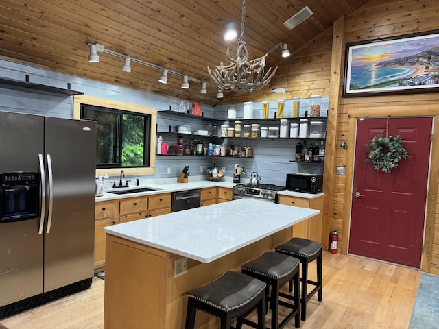 5 Canoe Ct Unit T3 R9, Nwp, ME 04462 - kitchen featuring black appliances, rail lighting, open shelves, light wood-style flooring, and a chandelier