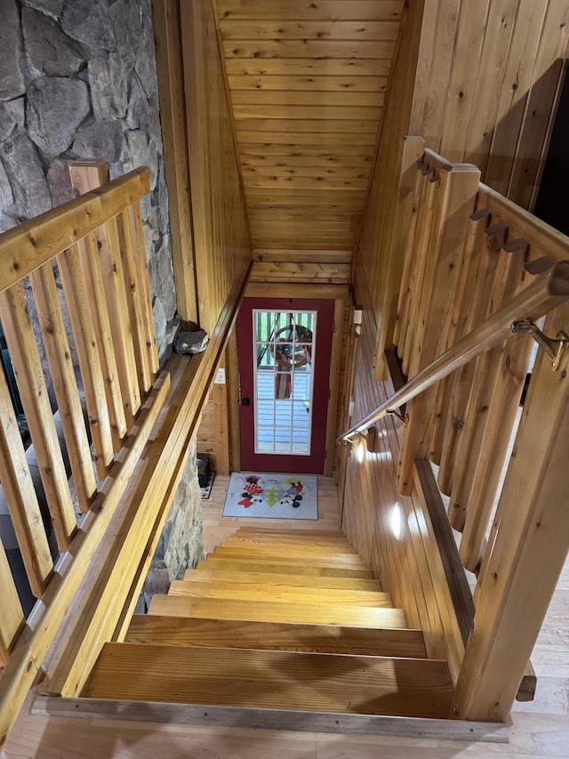 5 Canoe Ct Unit T3 R9, Nwp, ME 04462 - stairway featuring wood-type flooring, wooden walls, wood ceiling, and vaulted ceiling