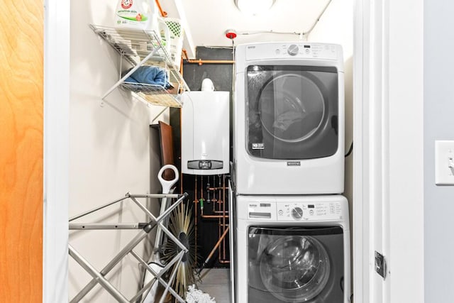 washroom with laundry area and stacked washer and clothes dryer
