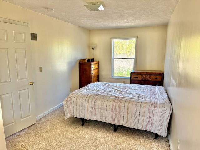 18 Hampton Ave, Old Orchard Beach, ME 04064 - bedroom with carpet, a textured ceiling, and baseboards