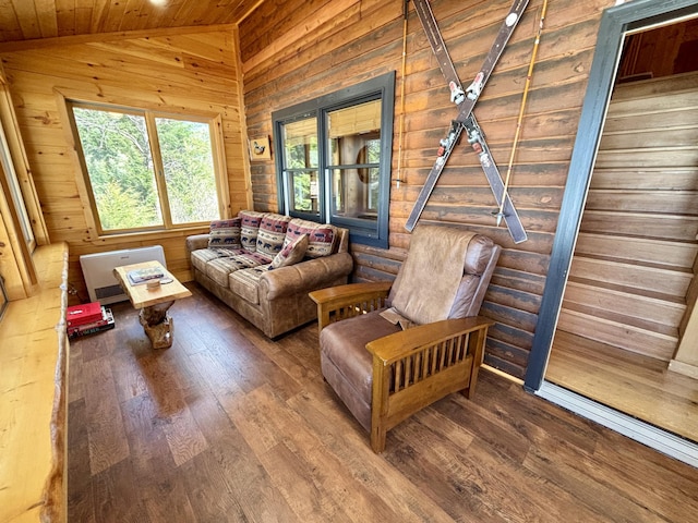 106 N Birch St, Greenville, ME 04441 - living area with wood finished floors, vaulted ceiling, and wood ceiling