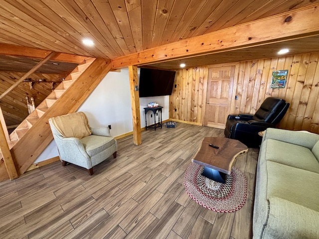 106 N Birch St, Greenville, ME 04441 - living room featuring wood finished floors, baseboards, stairway, wood ceiling, and wooden walls