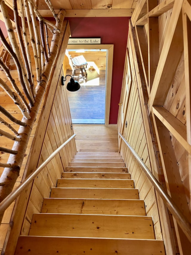 106 N Birch St, Greenville, ME 04441 - stairway featuring hardwood / wood-style floors