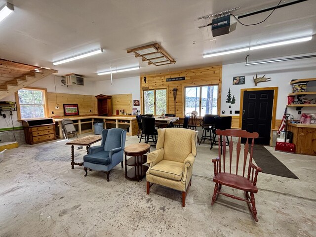 106 N Birch St, Greenville, ME 04441 - interior space with a garage door opener and wooden walls