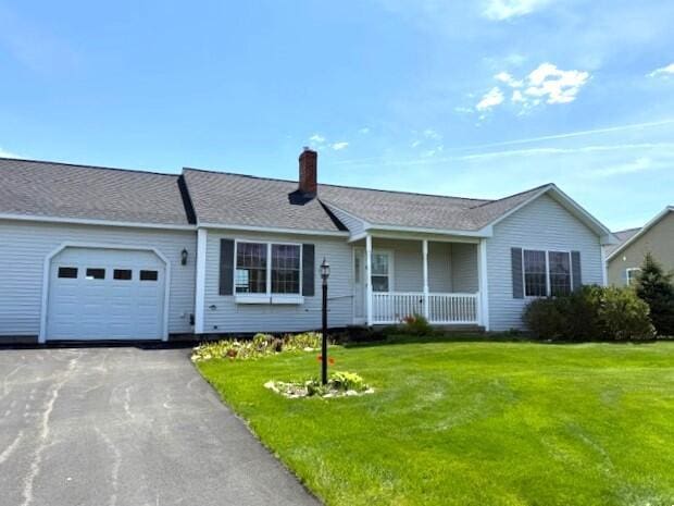 10 Private Dr Unit 10, Winslow, ME 04901 - single story home with an attached garage, a porch, a chimney, and a front yard
