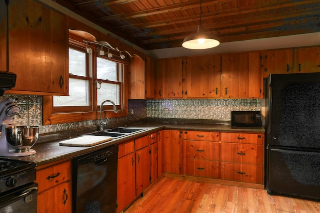 4 Mias Way, Ellsworth, ME 04605 - kitchen featuring black appliances, tasteful backsplash, a wooden ceiling with exposed beams, dark countertops, and brown cabinetry