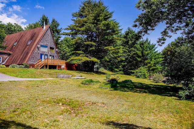4 Mias Way, Ellsworth, ME 04605 - view of green lawn featuring a wooden deck and stairway