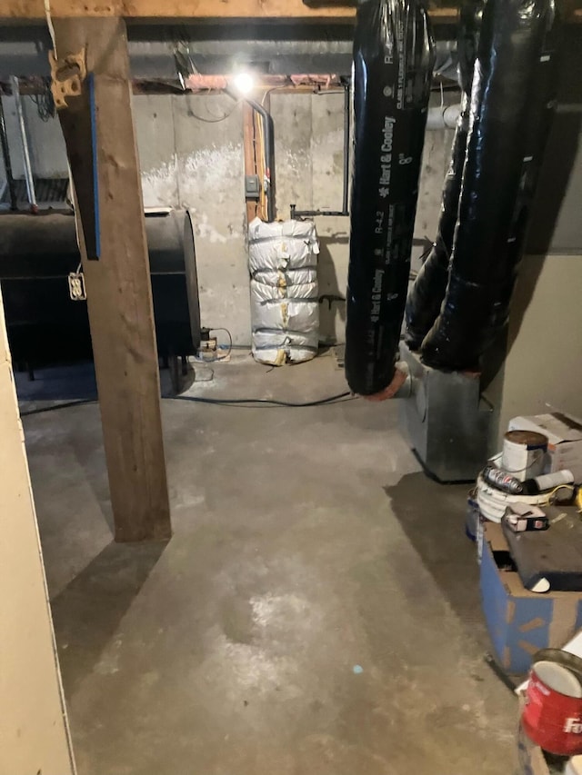 unfinished below grade area featuring heating fuel
