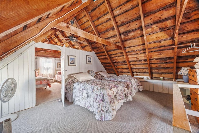 bedroom featuring carpet, lofted ceiling, and wood ceiling