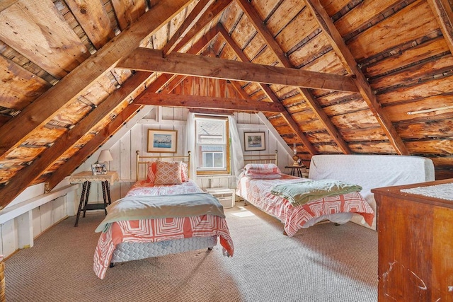 carpeted bedroom featuring vaulted ceiling and wooden ceiling