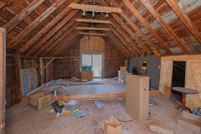 attic featuring an upstairs landing