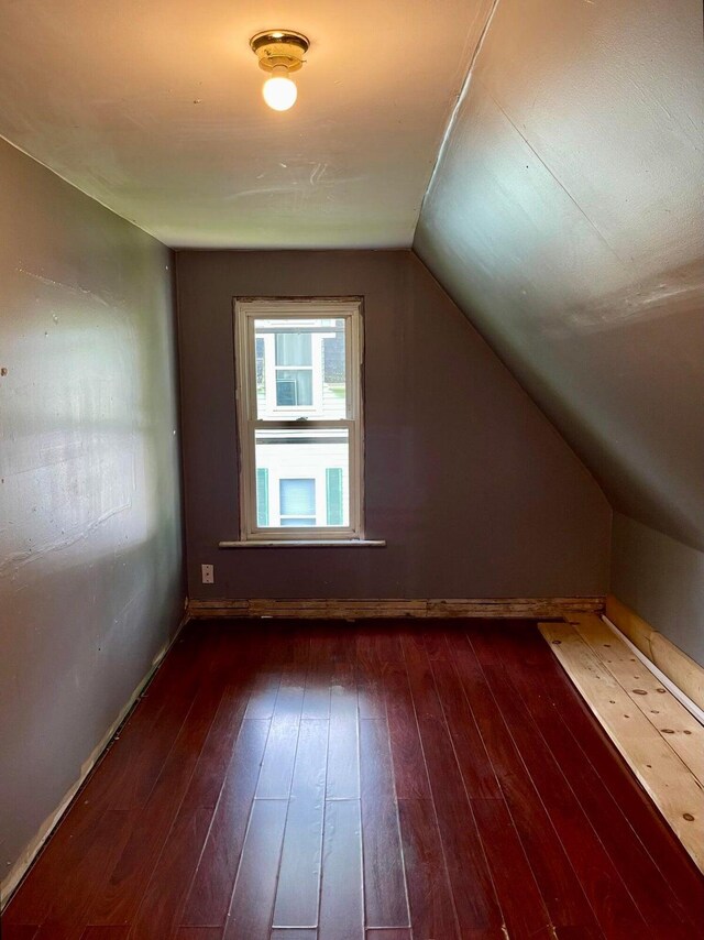 642 Main St, Old Town, ME 04468 - additional living space featuring dark wood-type flooring and lofted ceiling