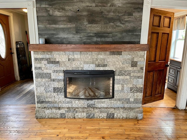 642 Main St, Old Town, ME 04468 - interior details with wood finished floors and a fireplace