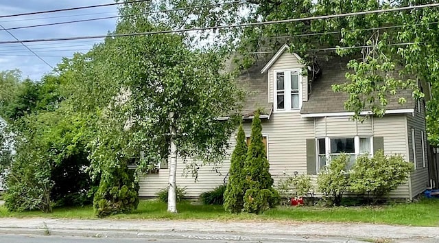 642 Main St, Old Town, ME 04468 - view of property exterior featuring a shingled roof