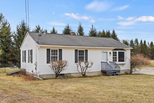 single story home with a front lawn and a chimney