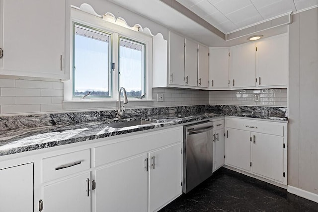 kitchen with tasteful backsplash, stainless steel dishwasher, and a sink