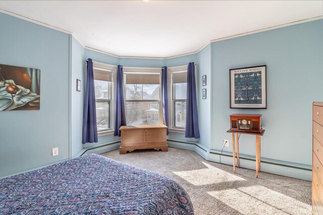 carpeted bedroom featuring baseboard heating and ornamental molding