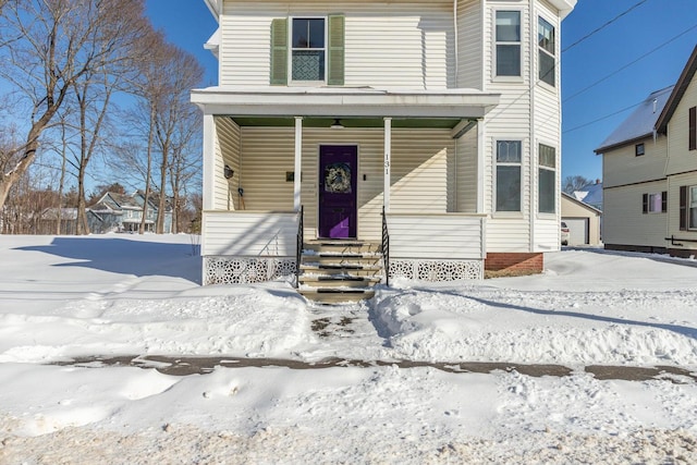 view of front facade with a porch and an outdoor structure