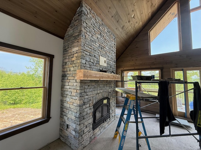 46 Harmony Row, Bethel, ME 04217 - living area with wooden ceiling, high vaulted ceiling, and a stone fireplace
