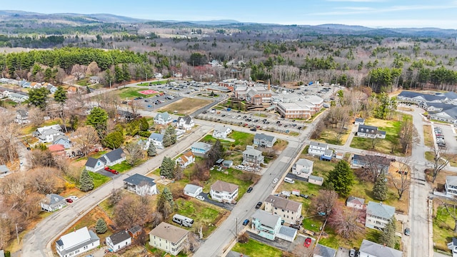 bird's eye view with a forest view and a residential view