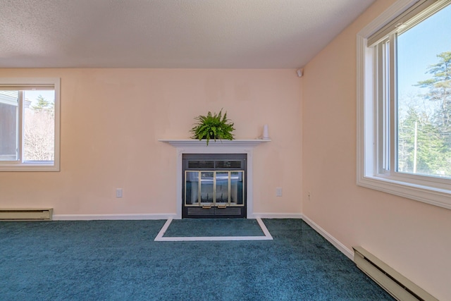 interior details with a fireplace with flush hearth, carpet flooring, a baseboard heating unit, and baseboards