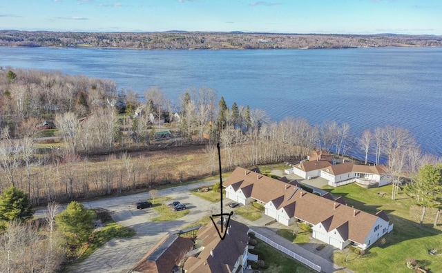 bird's eye view featuring a residential view and a water view